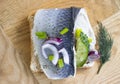 Herring sandwich blue snack salted cuisine gourmet dinner lunch cucumber norwegian on wooden background healthy