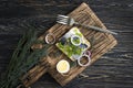 Herring sandwich blue onion plate dinner lunch cucumber norwegian on wooden background healthy