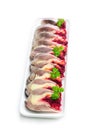 Herring slices stuffed with beetroot and potato arranged in a serving dish Royalty Free Stock Photo