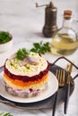 Herring under a fur coat. Layered salad with boiled eggs and vegetables: potato, carrot and beetroot