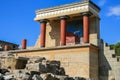 Travel around Europe by car. An ancient ruins of Greek Knossos palace and group of tourists. Royalty Free Stock Photo