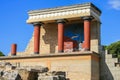 Travel around Europe by car. An ancient ruins of Greek Knossos palace and group of tourists. Royalty Free Stock Photo