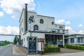 Hertog Jan beer brewery against a clear blue sky