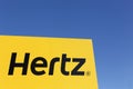 Hertz logo on a panel