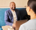 Hes an awesome mentor. a handsome mature businessman meeting with a female colleague in the office. Royalty Free Stock Photo