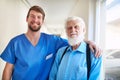 Hes become so much more than my patient. Portrait of a young doctor and his senior patient posing together in the