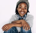 Hes a cool kid. Portrait of a young boy sitting in the studio. Royalty Free Stock Photo