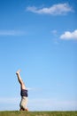 Hes got moves. Full length shot of a handsome mature man doing yoga outdoors. Royalty Free Stock Photo