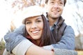 Hes my number one. A handsome young man embracing his girlfriend while they spend time out in nature. Royalty Free Stock Photo