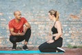 Hes the one to get me in shape. a young woman working out with her personal trainer. Royalty Free Stock Photo