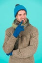 Hesitating and doubtful. Man handsome unshaven guy wear winter accessories. Winter season sale. Hipster knitted winter Royalty Free Stock Photo