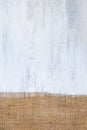 Hessian fabric on white wood texture background Royalty Free Stock Photo