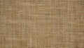Hessian sackcloth burlap woven texture background, Cotton woven fabric close up with flecks of varying colors of beige and brown Royalty Free Stock Photo