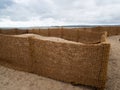 Hessian type fence biodegradable matting retaining sand to protect nearby houses, property from encroachment. Instow, north Devon Royalty Free Stock Photo