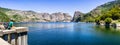 Hetch Hetchy reservoir on a sunny summer day; Wapama and Tueeulala Falls visible in on the far side of the lake; Yosemite National