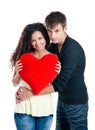 Heterosexual couple with a big heart Royalty Free Stock Photo