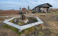 Hetta, Finland - 09.19.2021:Open fireplace with wooden benches around it in Finnish tundra. Pahakuru area, Pallas