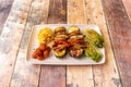 Heura Skewers with Peppers and Zucchini with Broken Heart, Coleslaw Royalty Free Stock Photo