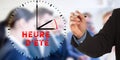 Heure d`ete, French Daylight Saving Time, Business man hand writ Royalty Free Stock Photo