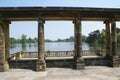 Hever castle garden's colonnade, patio at a lakeside in England