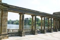 Hever castle garden's colonnade, patio at a lakeside in England