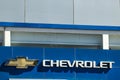 hevrolet automobile dealership exterior and trademark logo. Chevrolet is an American automotive brand