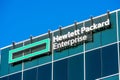 Hewlett Packard Enterprise sign, logo on headquarters building of enterprise information technology company in Silicon Valley. -