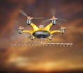 Hexacopter with crop sprayer flying in the sunset sky Royalty Free Stock Photo