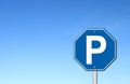 Hexagon parking sign with blue sky Royalty Free Stock Photo