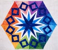 Hexagon patchwork block like kaleidoscope, detail of quilt Royalty Free Stock Photo