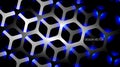 The hexagon vector background is dark gray with light blue and overlapping Royalty Free Stock Photo
