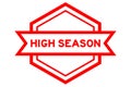 Hexagon vintage label banner in red with word high season on white background Royalty Free Stock Photo