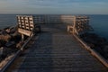 Hex-angular dock overlooking a quiet sea