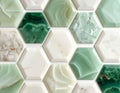Hexagonal marble tiles in shades of green and white tightly arranged Royalty Free Stock Photo