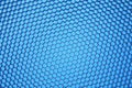 Hexagonal mesh on a blue background.
