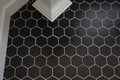 Hexagonal pattern of a bathroom floor Royalty Free Stock Photo