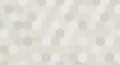Hexagonal pattern with a gradient of beige, gray, and white tones. The symmetrical Royalty Free Stock Photo