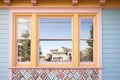 hexagonal patterned window trims on a queen anne home