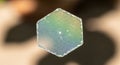 A hexagonal soap bubble capturing iridescent colors, surrounded by Royalty Free Stock Photo