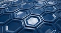 Hexagonal tiles with a glossy, blue finish cover the surface. Each tile is three- Royalty Free Stock Photo