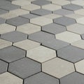 Hexagonal tiles in a repeating pattern cover the surface, with alternating light and dar Royalty Free Stock Photo