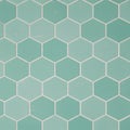Hexagonal tiles with shades of teal and light blue create a geometric pattern. Each tile Royalty Free Stock Photo
