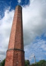 Hexahedral ancient factory brick chimney Royalty Free Stock Photo