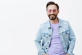 Hey babe, wanna hang out. Portrait of handsome hot adult man with beard and moustache in trendy sunglasses and denim Royalty Free Stock Photo