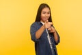 Hey, we need you! Portrait of happy optimistic girl in denim shirt pointing finger to camera and smiling, choosing lucky Royalty Free Stock Photo