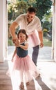 Hey, now you got it baby. Shot of an adorable young girl and her father dancing together at home. Royalty Free Stock Photo