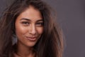 Hey, the tousled look is in okay. Portrait of a beautiful young woman posing in the studio. Royalty Free Stock Photo