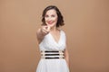 Hey you! Beautiful adult woman pointing finger at camera Royalty Free Stock Photo