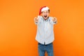 Hey you! New year is coming! Attractive man pointing finger at c Royalty Free Stock Photo