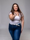 Portrait of funny plus size women with long hair in white t-shir